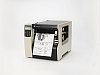 Image of a Zebra 220Xi4 Printer with label